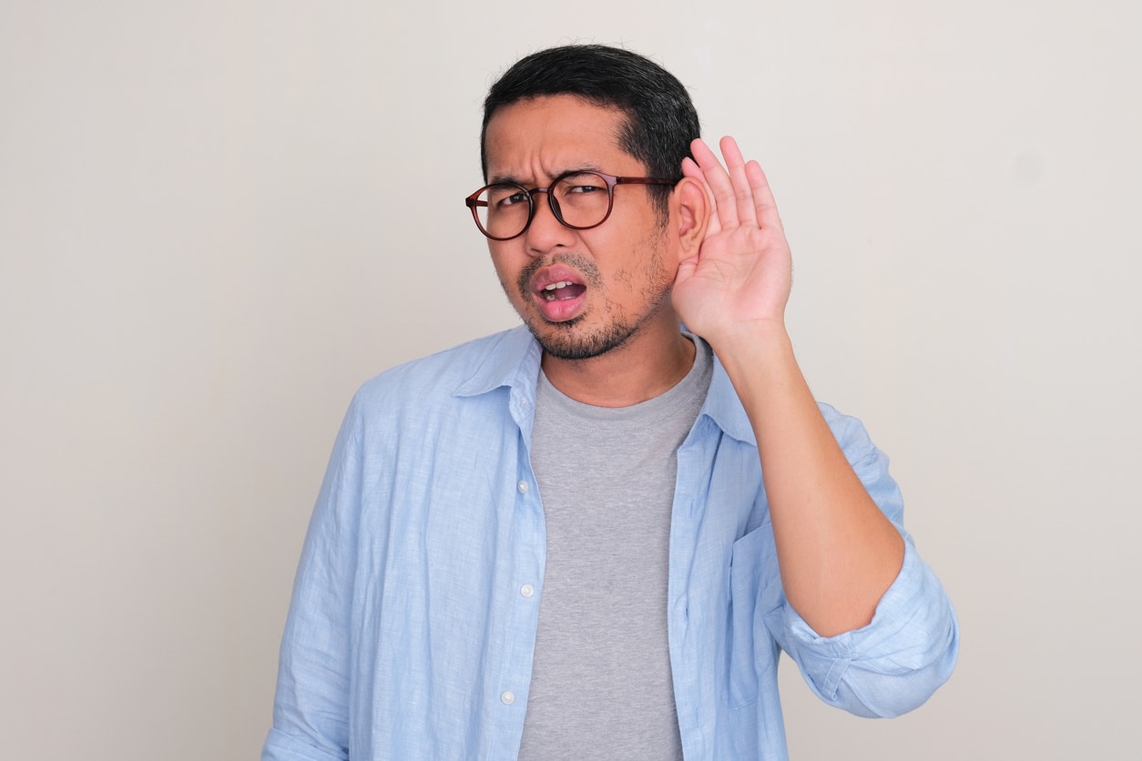 Man wondering what tinnitus sounds like.